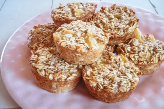 pineapple coconut muffins on pink plate