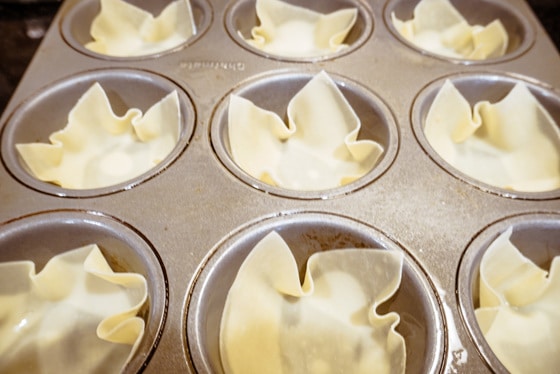 wonton wrappers in muffin pan