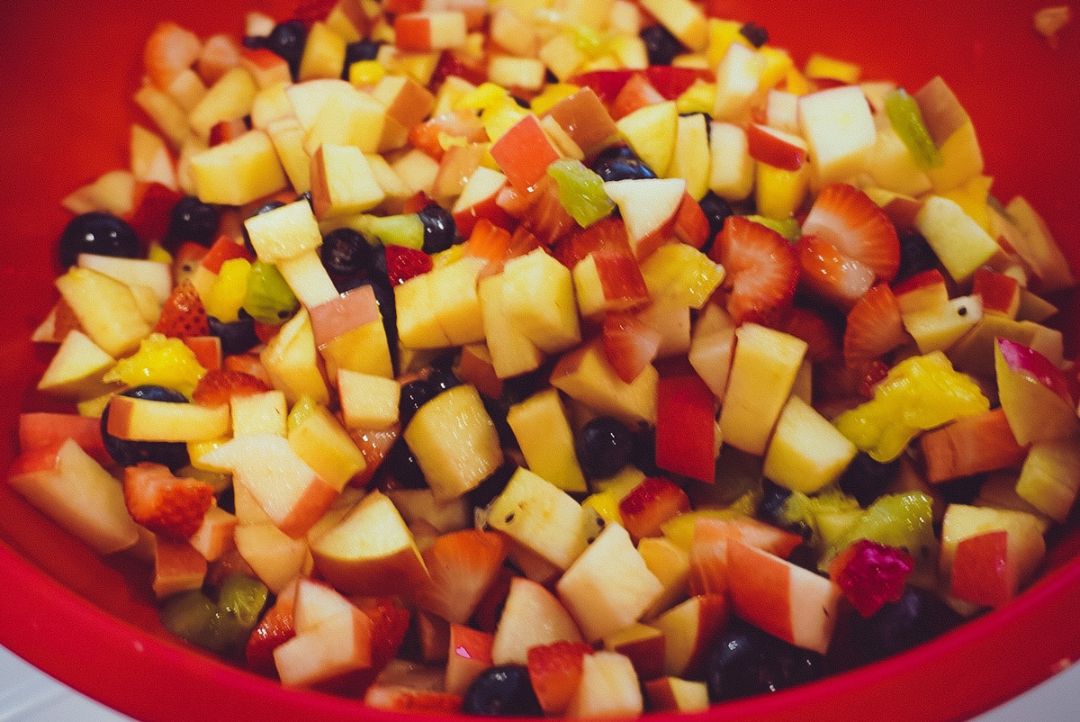 fruit salad in a red bowl