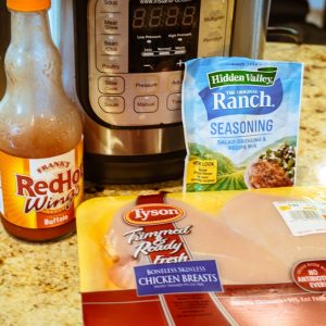 buffalo chicken ingredients in front of instant pot