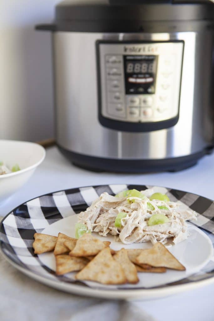 chicken salad in front of the instant pot