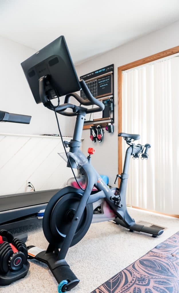 peloton bike in a home gym