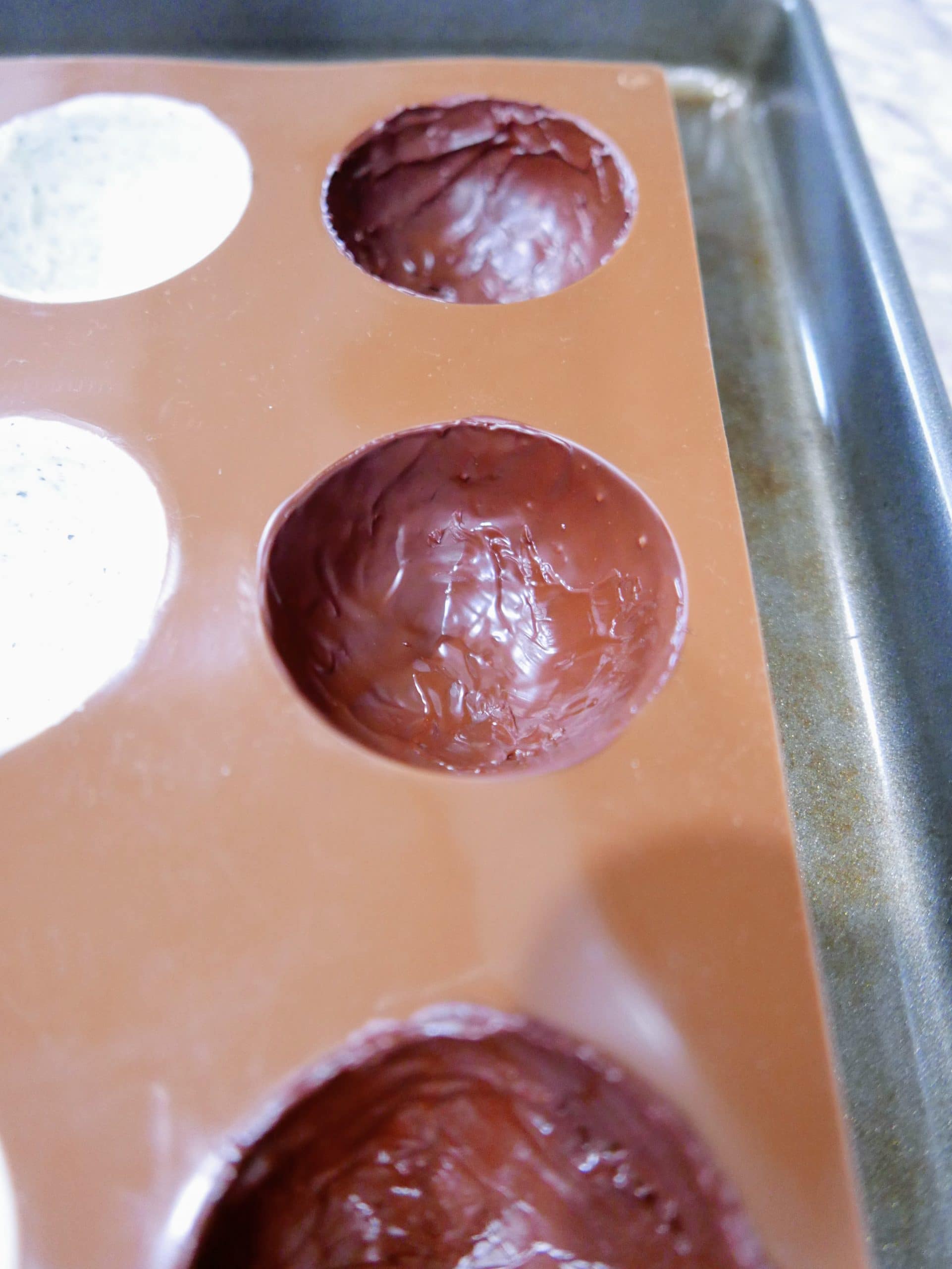 coating the silicon mold with chocolate