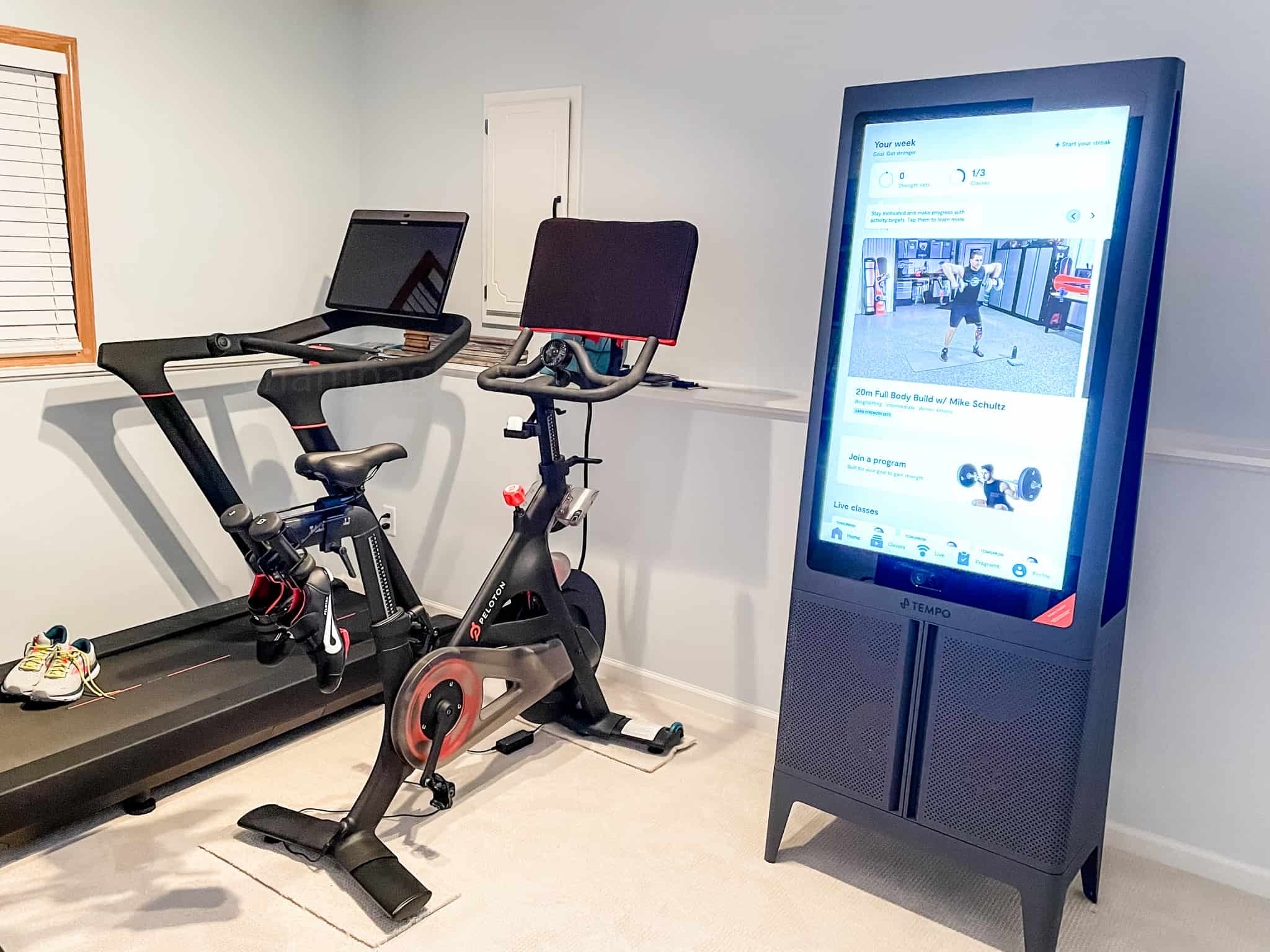 tempo studio with peloton bike and treadmill