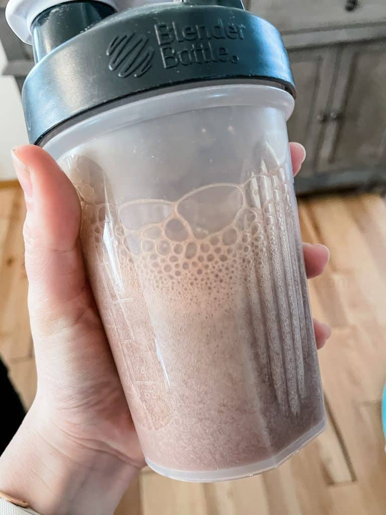 chocolate brownie shake in a shaker bottle