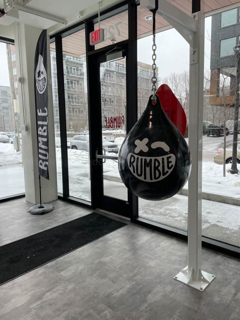 inside rumble boxing studio with boxing bag