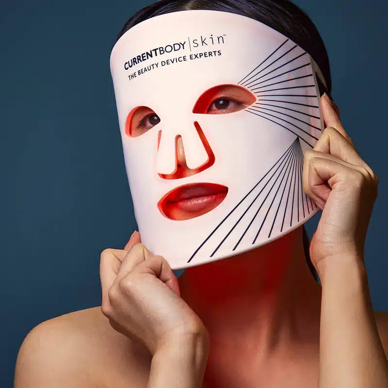 woman wearing an led mask