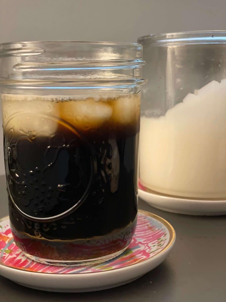 wandering bear black coffee in a mason jar glass