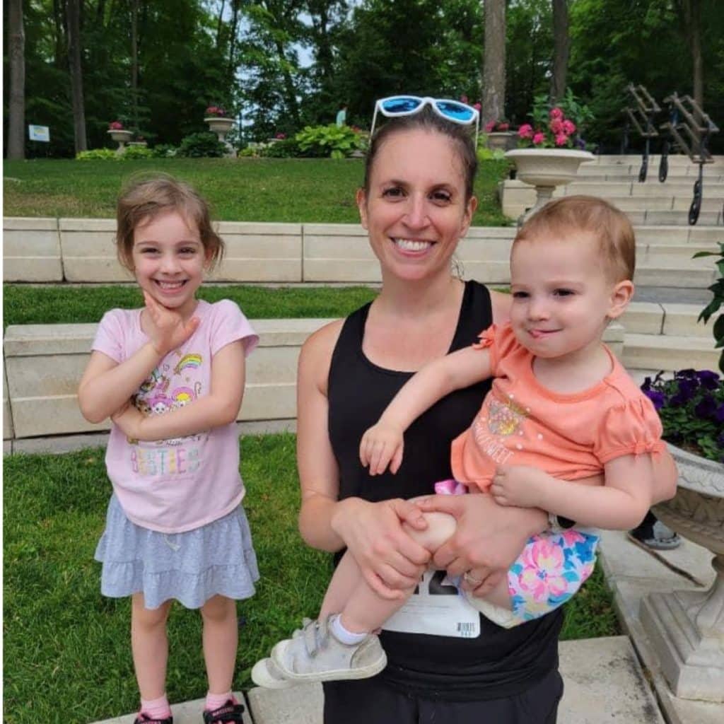 ali van straten with her kids at a race