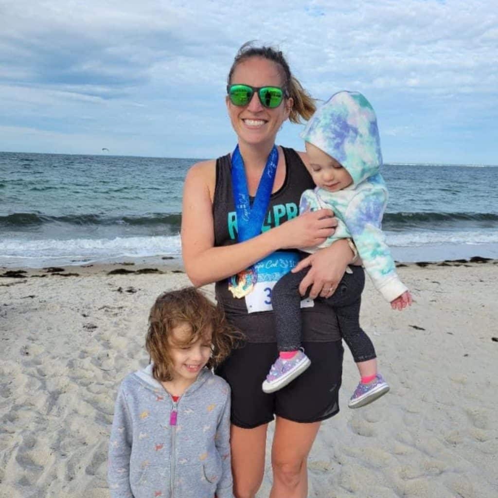ali van straten with her kids at a race on the beach
