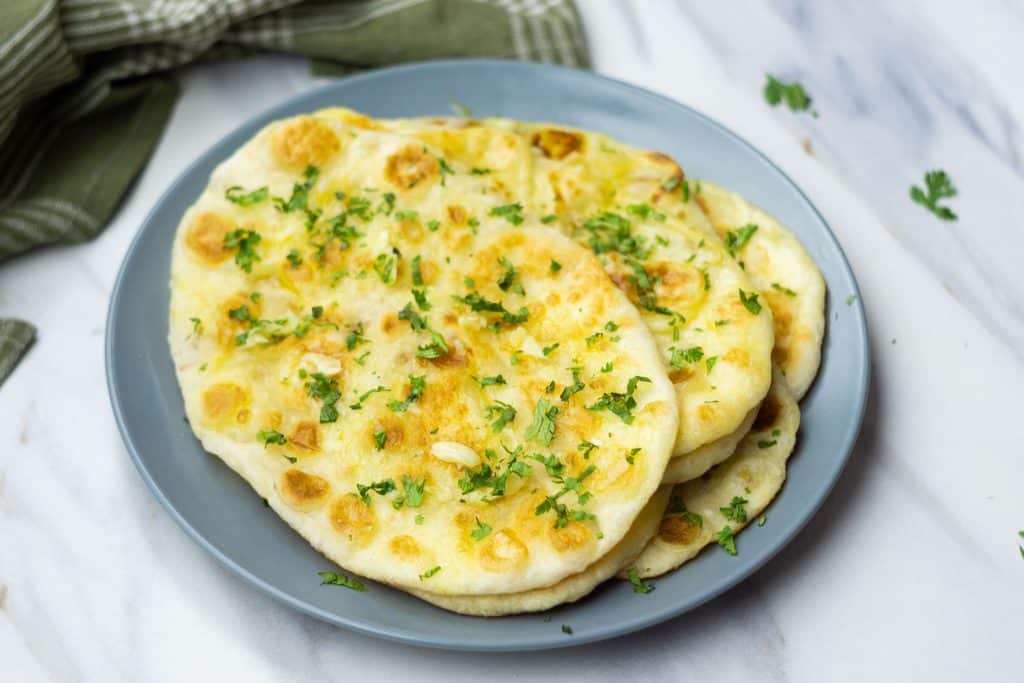 naan bread on a blue plate