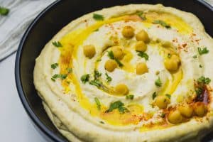 hummus in a bowl with chickpeas