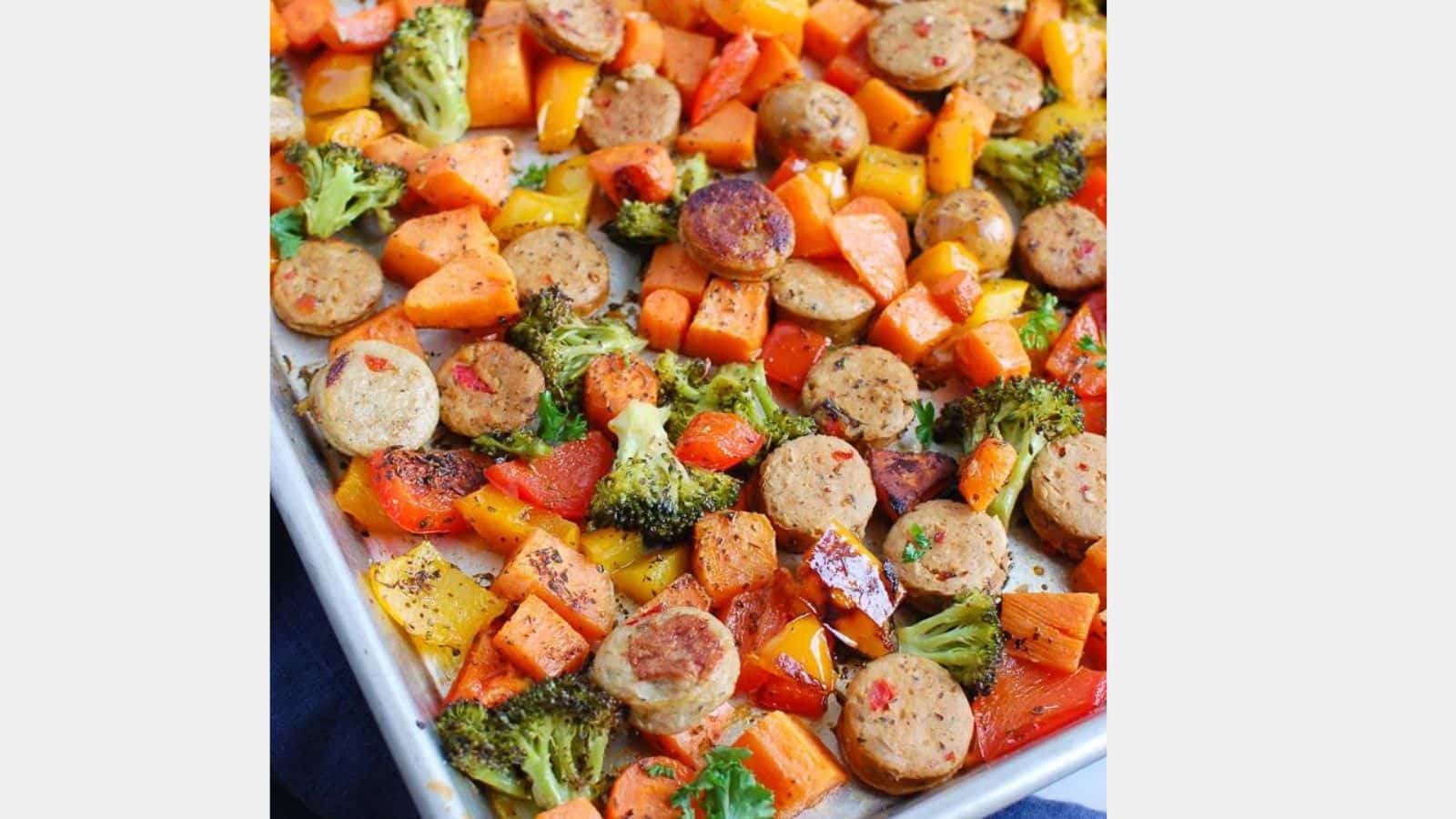 chicken sausage and veggies on a sheet pan