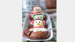 melting snowman on top of chocolate cookies