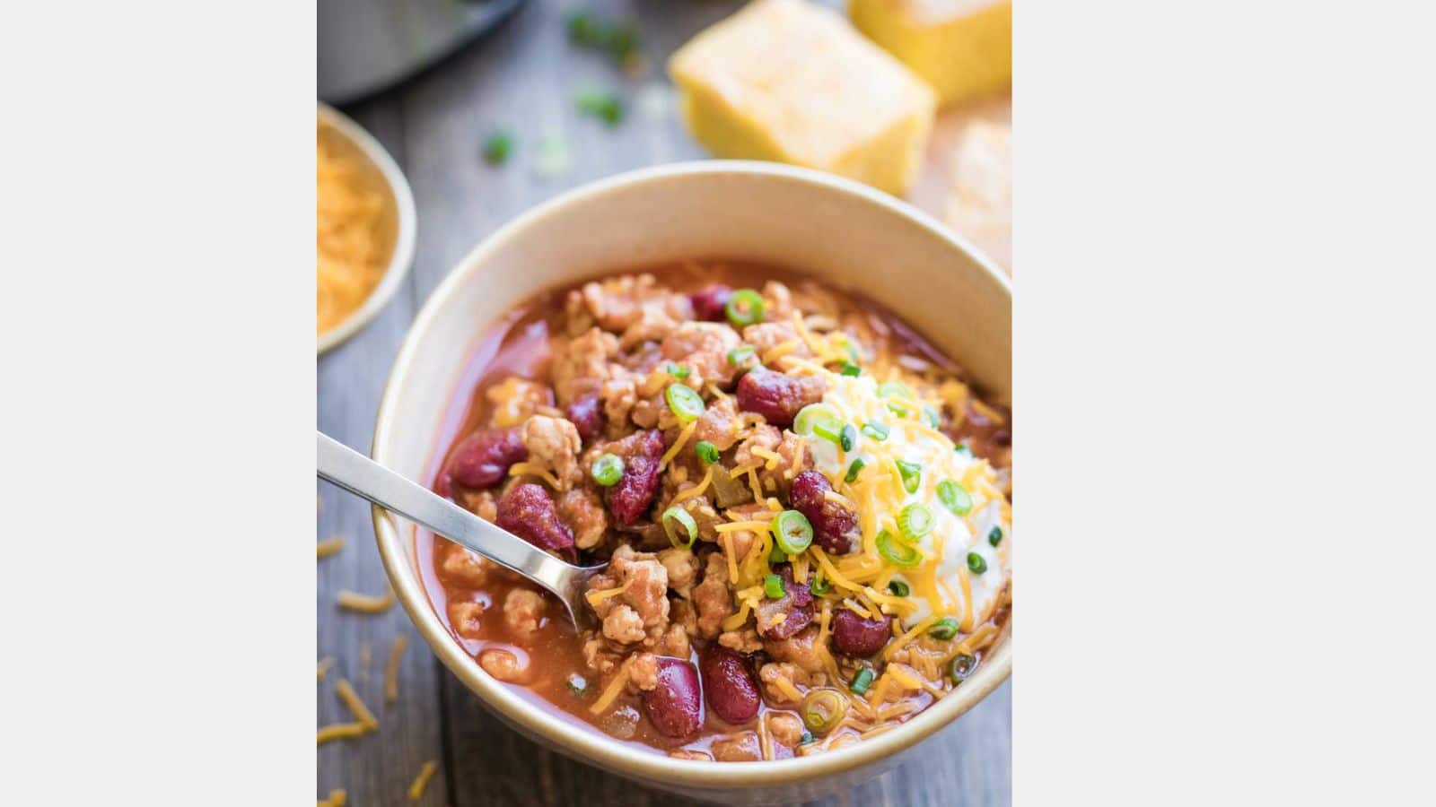 turkey chili in a bowl with a spoon