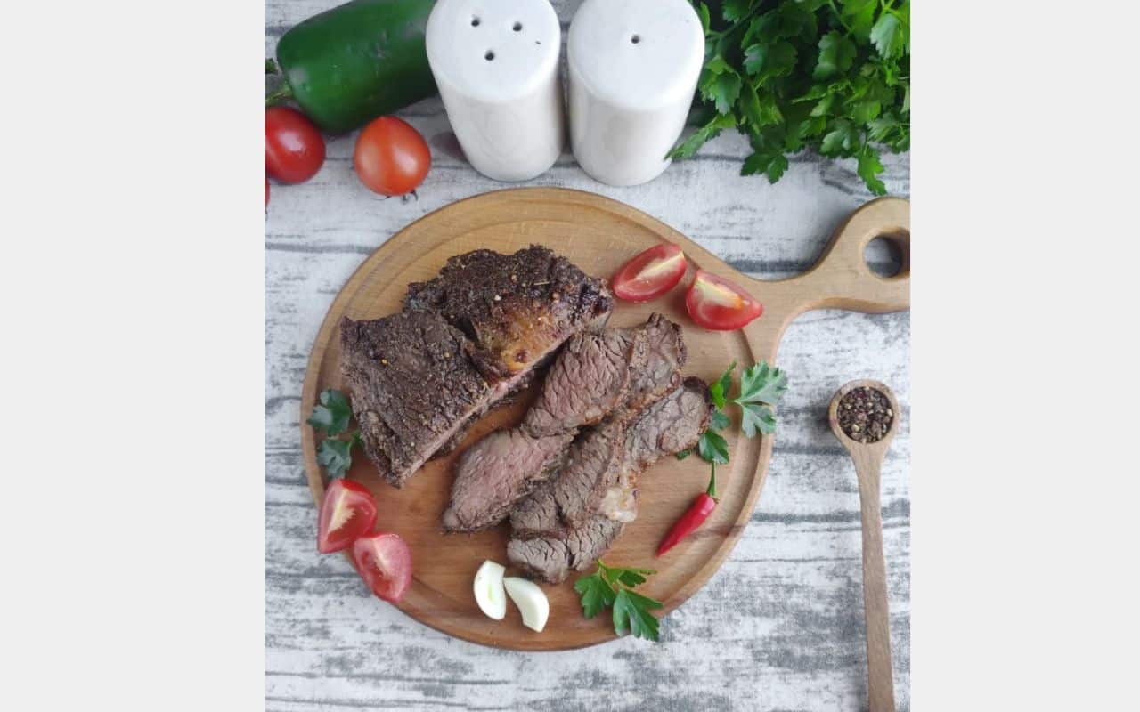 steak on a plate with spices