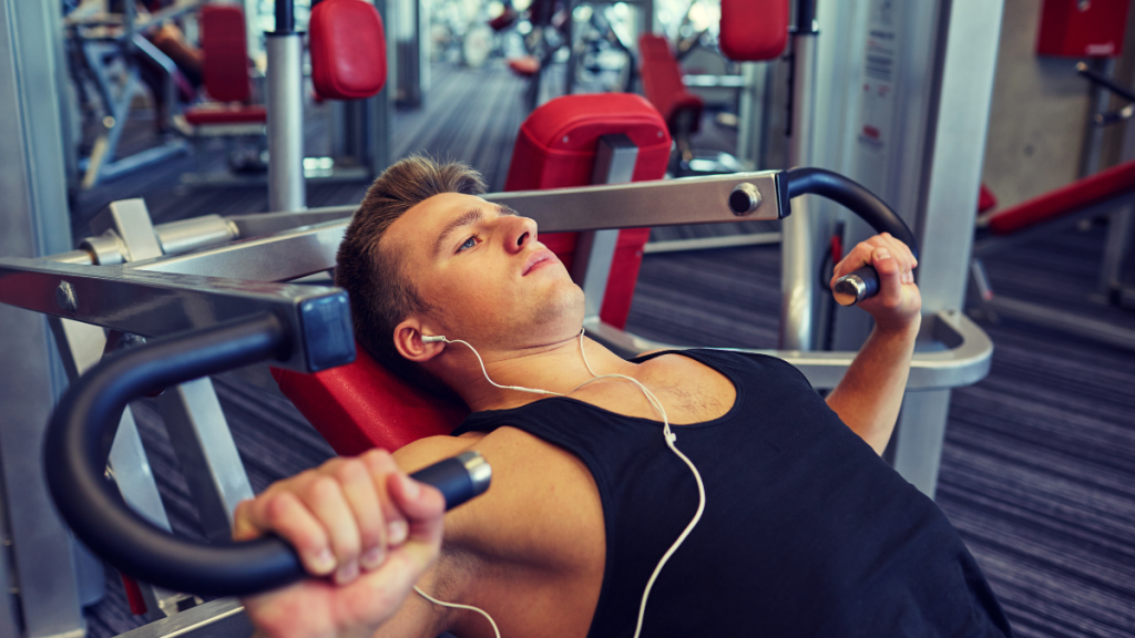 man with music at gym