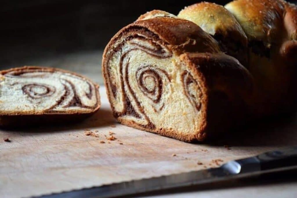 Cozonac - Easter bread sliced open to show the beautiful swirl created when baked with a nutty filling.
